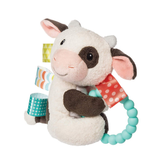 Mary Meyer Buttercup Cow Rattle with plush cow, aqua teething ring and colourful satin Taggies ribbons for babies to hold, chew and explore.