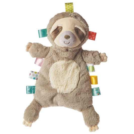Mary Meyer Taggies Molasses Sloth plush comforter with a smiling sloth face, soft brown body, cream belly patch and colourful satin ribbon tags around the edges.