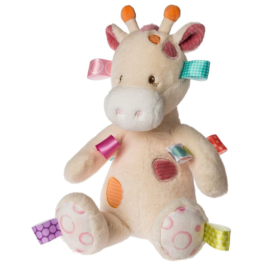 Mary Meyer Taggies Tilly Giraffe soft toy with a cream plush body, embroidered features, colourful fabric patches and satin ribbon tags on the arms, legs and head.