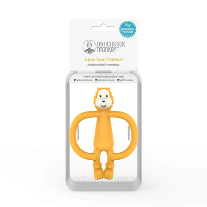 A yellow lion teether packaged inside a clear plastic hanging box with a card insert showing the character illustration.