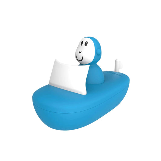 Matchstick Monkey Bathtime Boat Set – Blue shown as a silicone boat toy with a smiling detachable monkey figure and a white sail.