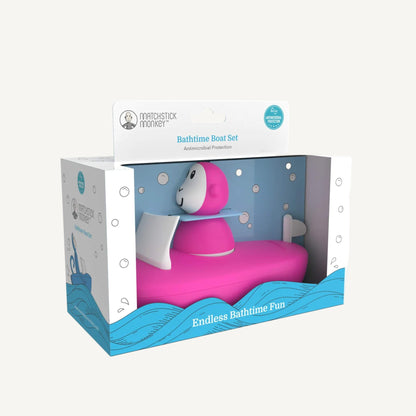 Pink boat toy and character packaged in its retail box, featuring a clear window and illustrated design with bath-themed graphics.