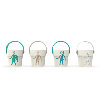 A row of four small cream buckets with coloured handles and playful character illustrations printed on the front.