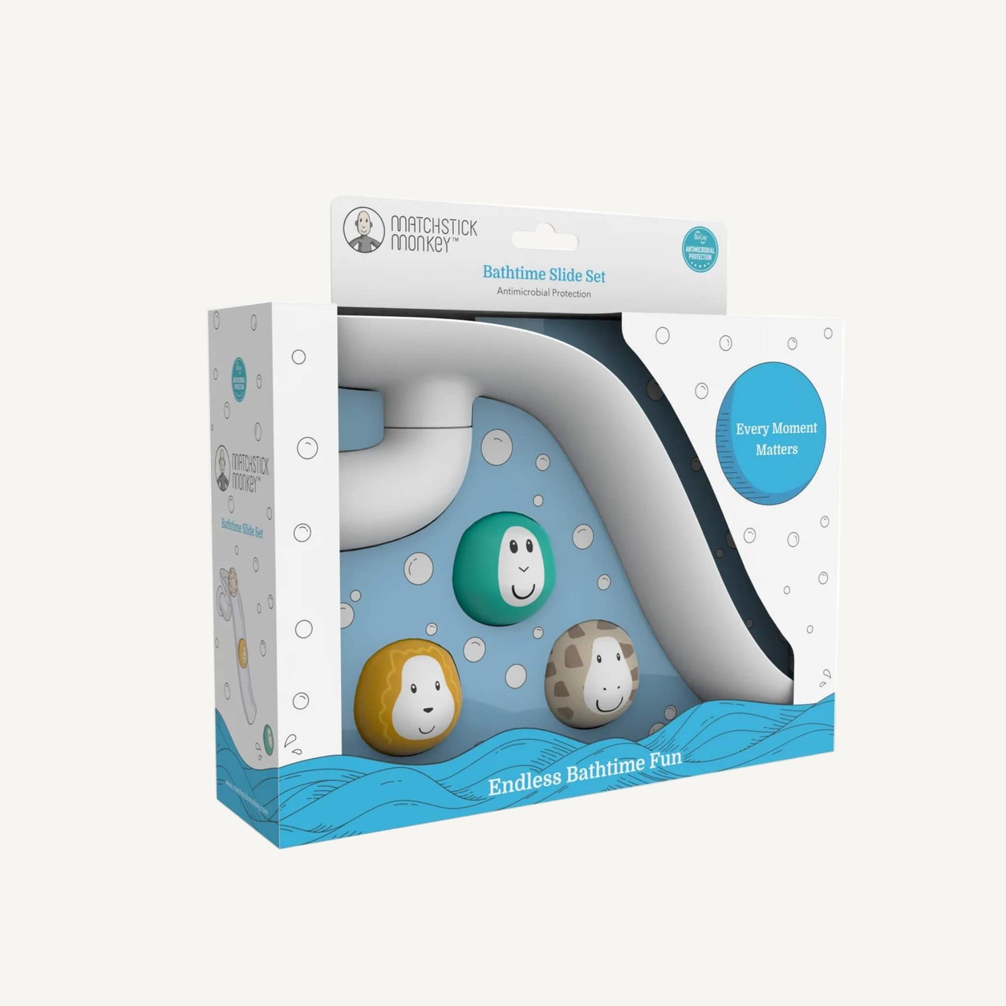 Retail packaging displaying a white bathtime slide toy and three animal character balls through a clear window, with bubble graphics printed on the box.