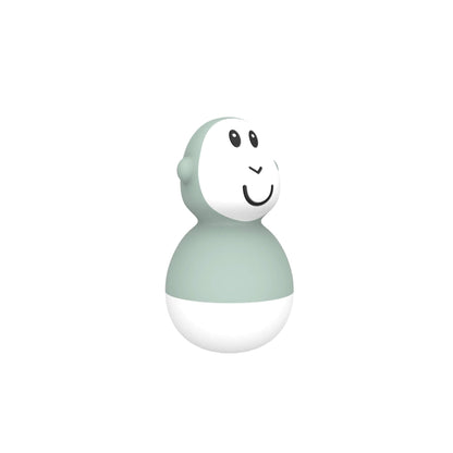 A single mint green wobbling bath toy is shown upright against a white background, highlighting its rounded shape and smooth finish.