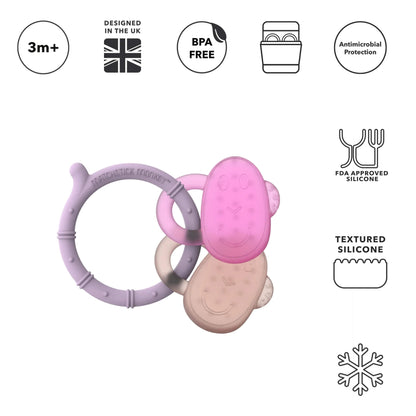 A lilac silicone teething ring with pink and neutral monkey face cooling teethers displayed beside icons showing BPA-free silicone, antimicrobial protection, textured silicone surface and fridge cooling.