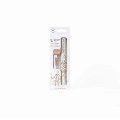 A baby electric toothbrush in its retail packaging with a clear window showing the brush handle, spare head and illustrated giraffe-print tube.