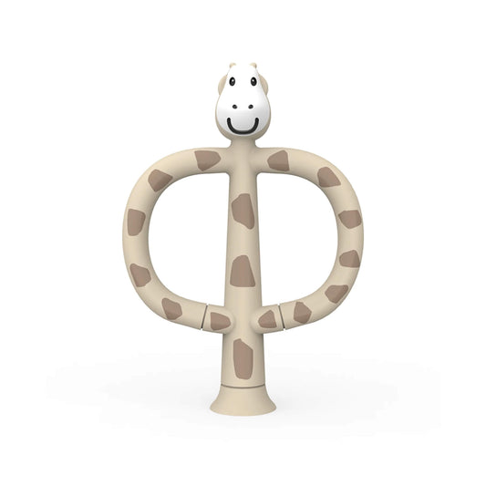 Matchstick Monkey Giraffe Training Toothbrush shown upright with wide looped handles, a smiling giraffe head and soft silicone detailing in a neutral spotted design.