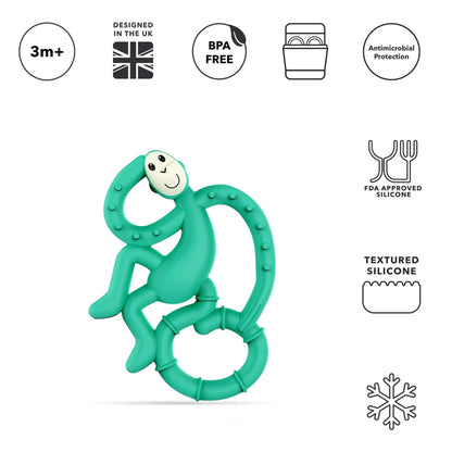 A green silicone teether shaped like a small monkey is shown upright with a curved tail, textured bumps and smooth limbs, placed against a white background beside icons for age and safety features.