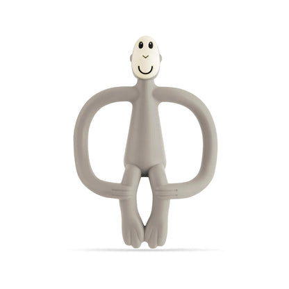 Grey Matchstick Monkey Original Teething Toy shown upright with its wide looped arms, soft flexible legs and smooth rounded head, all made from textured silicone for teething babies.