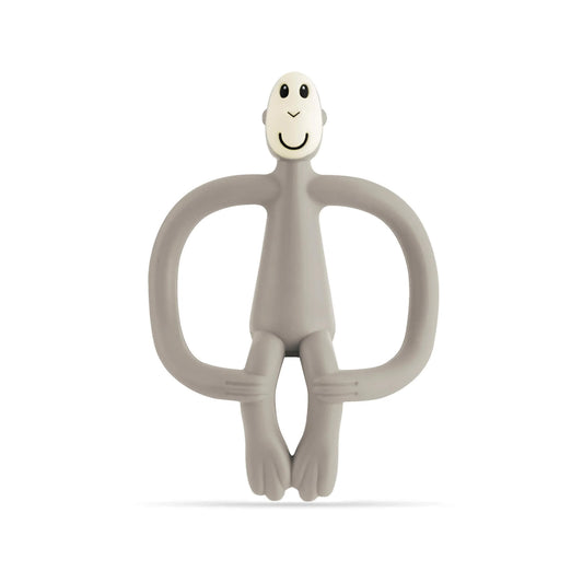 Grey Matchstick Monkey Original Teething Toy shown upright with its wide looped arms, soft flexible legs and smooth rounded head, all made from textured silicone for teething babies.