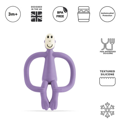 A purple silicone monkey-shaped teether shown upright with small product icons above it indicating BPA-free material, antimicrobial protection and dishwasher compatibility.