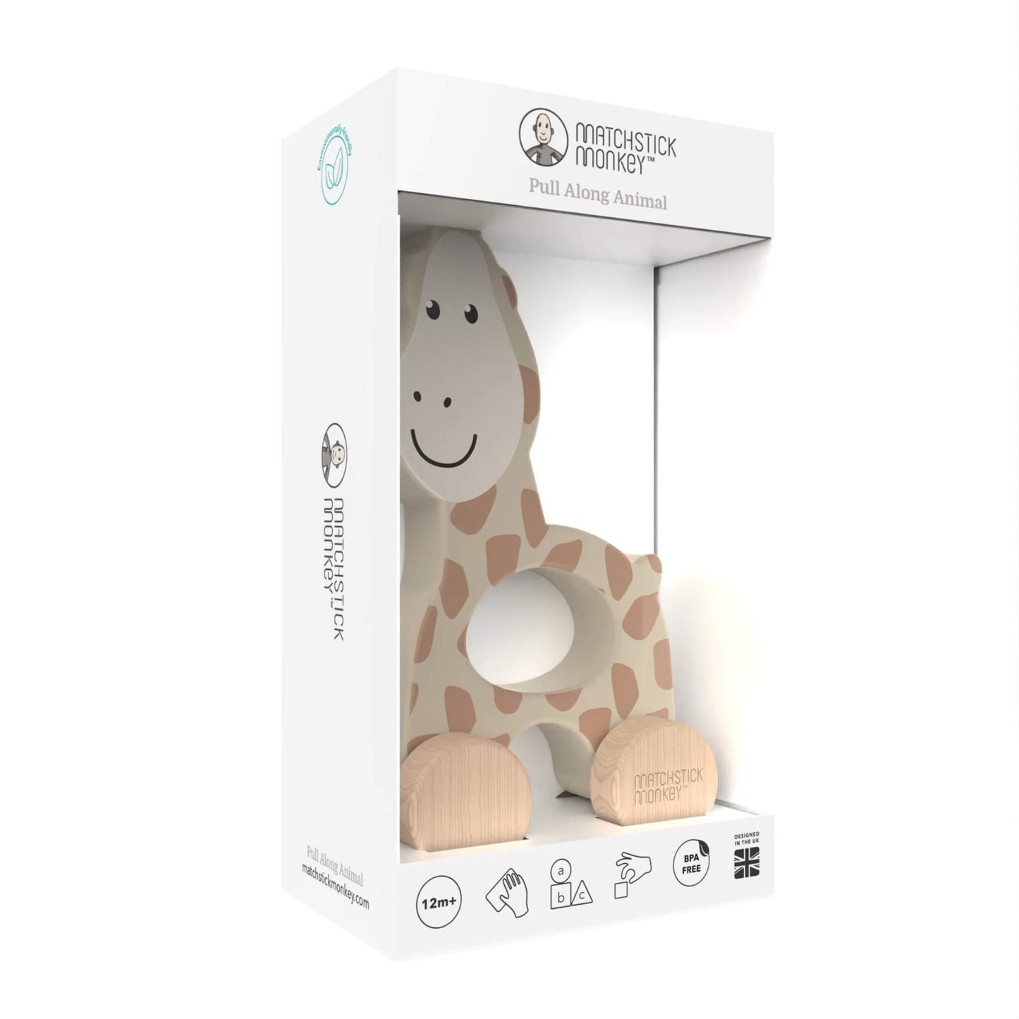 A boxed wooden giraffe pull toy displayed inside clear packaging with a white cardboard frame around it.