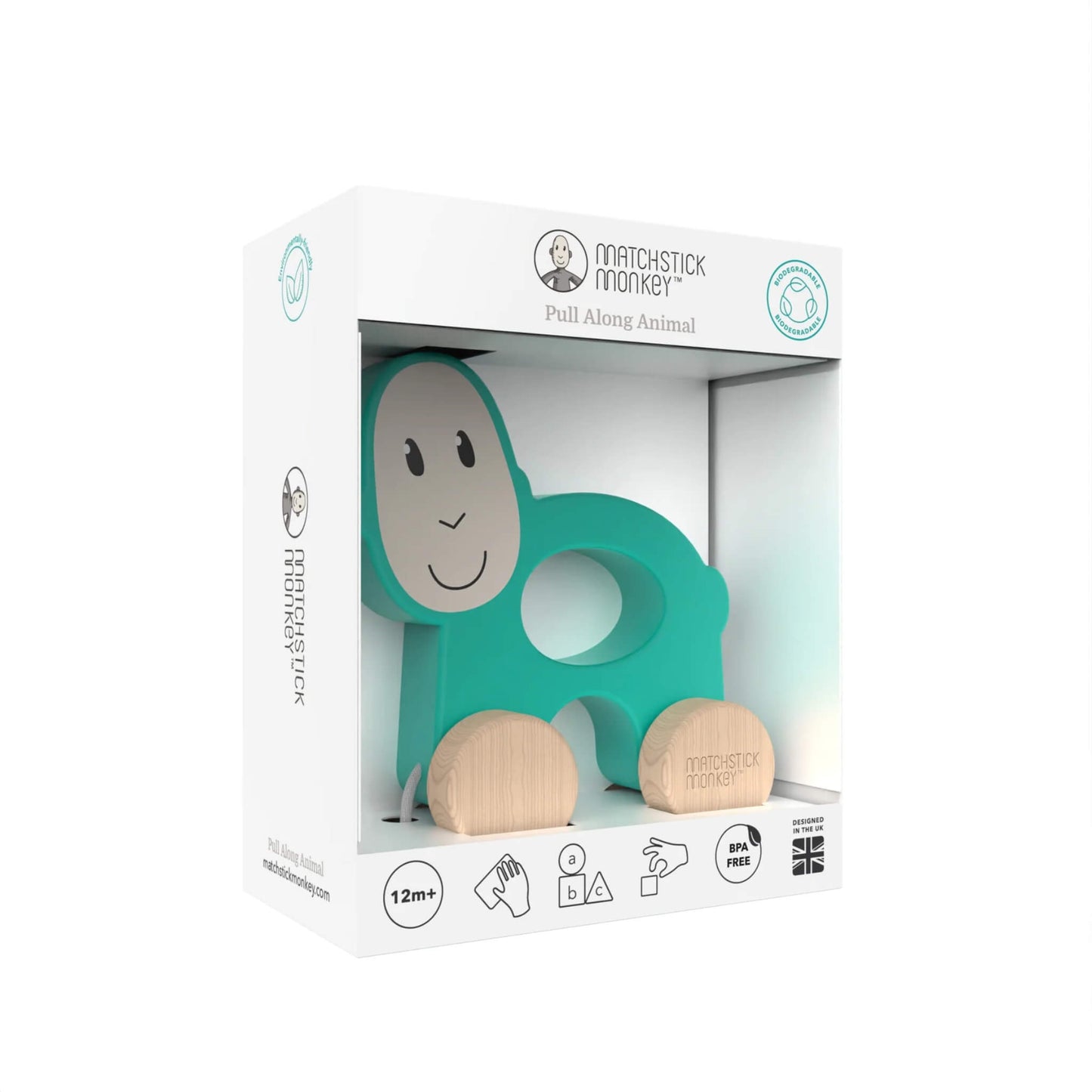 A boxed Matchstick Monkey pull-along monkey toy packaged in a white display box with a clear front panel.
