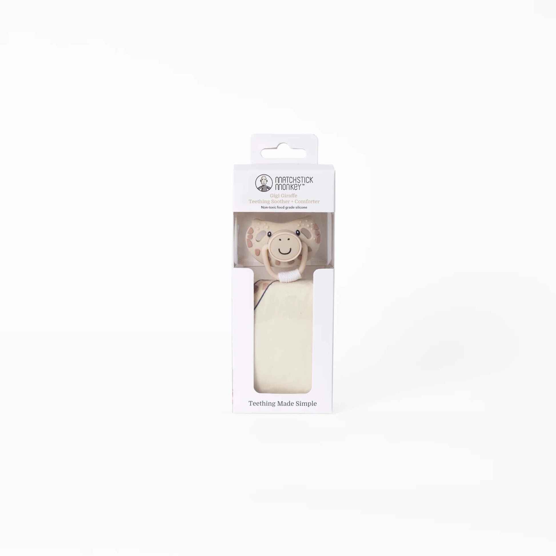 Packaged giraffe-themed soother and matching comforter displayed inside a tall white retail box with a clear window.
