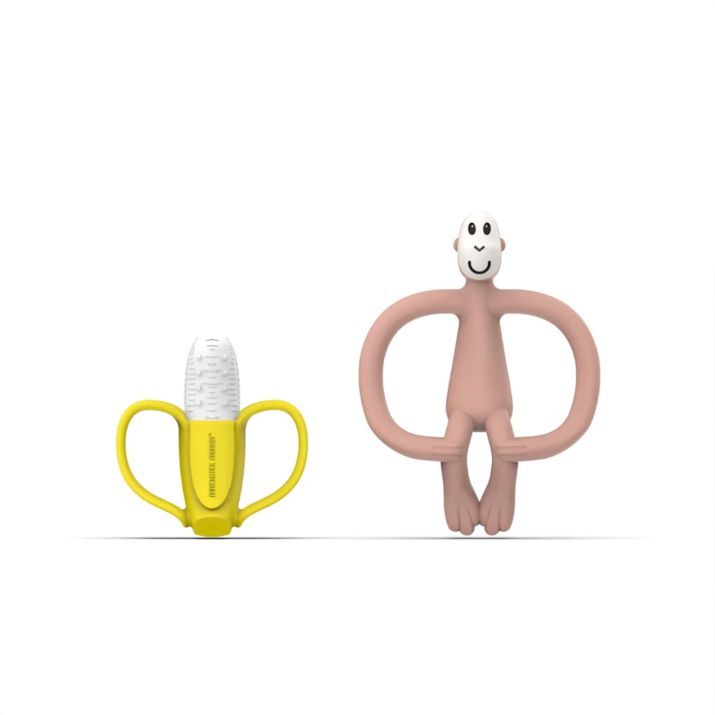 A dusty pink silicone monkey teether standing upright next to a yellow banana-shaped teething soother displayed on a white background.