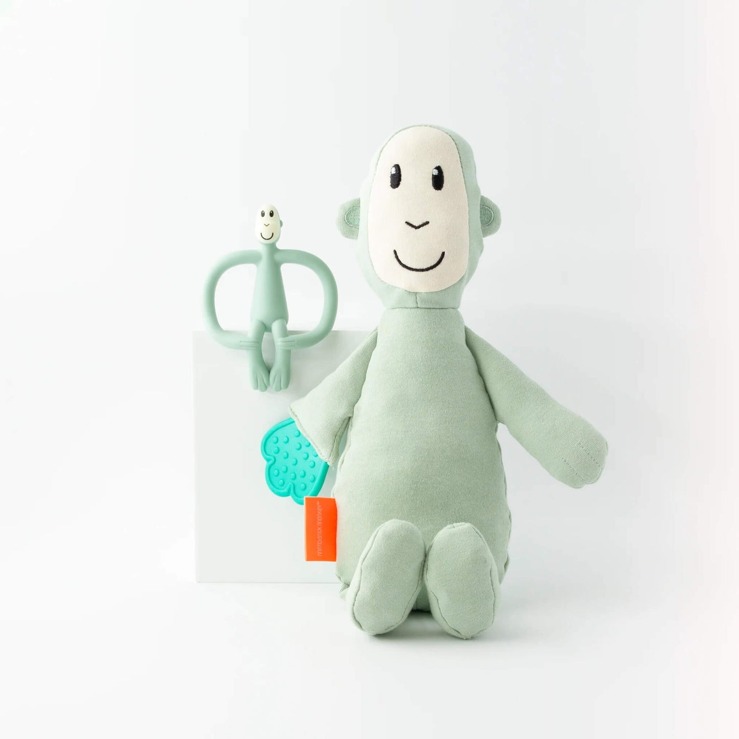 A Matchstick Monkey Sensory Teething Teddy Set featuring a soft monkey comfort toy with attached textured teething leaf and matching silicone monkey teether.