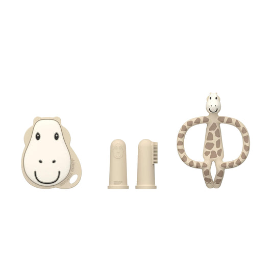 Matchstick Monkey Teething Starter Set in the Gigi Giraffe design displayed with a flat teether, two silicone finger toothbrushes, and a giraffe-shaped teether arranged in a row.