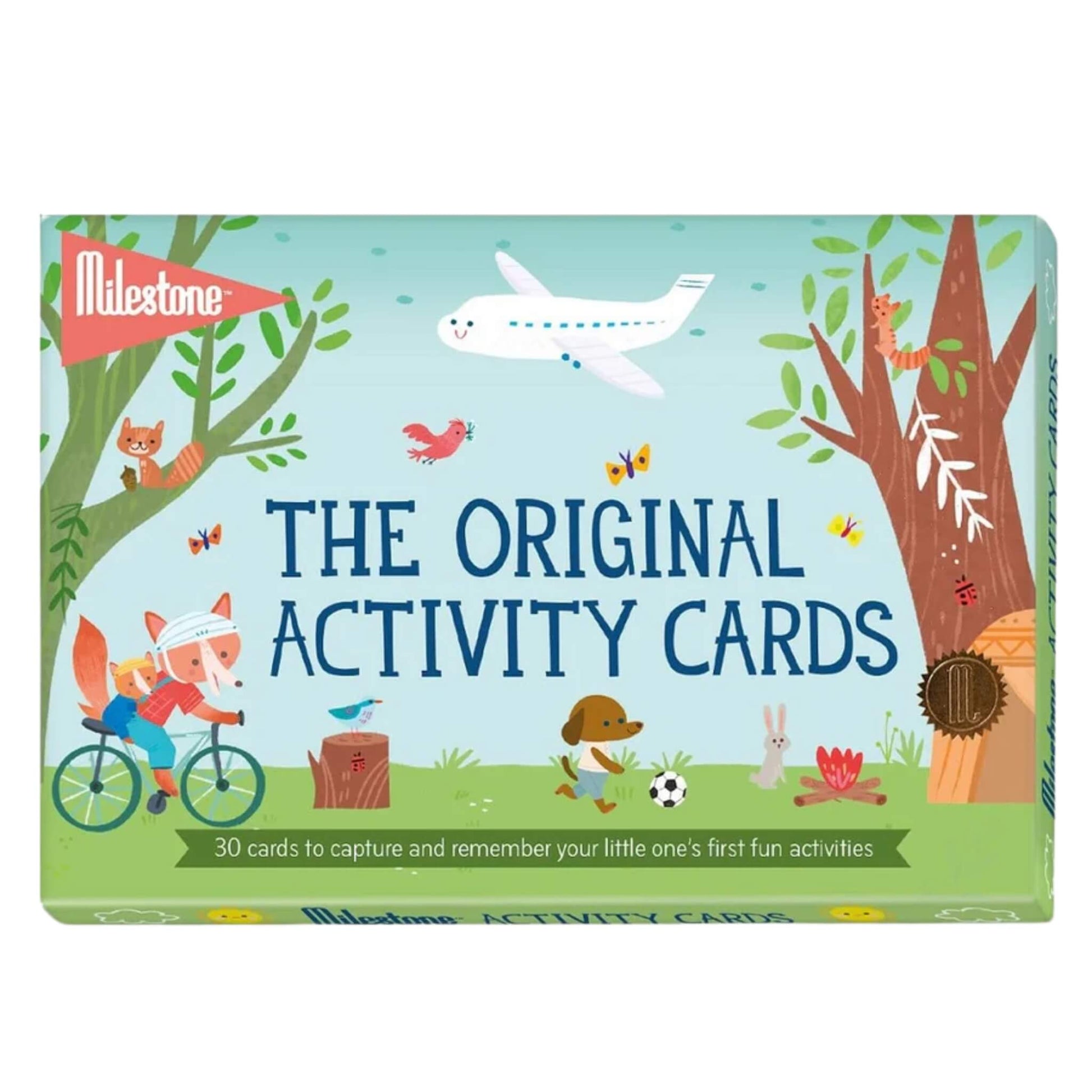 A box of Milestone The Original Activity Cards featuring playful woodland illustrations, an aeroplane, and the text ‘30 cards to capture and remember your little one’s first fun activities.