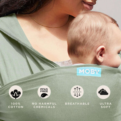 Close-up of baby resting in soft Pear green wrap beside icons for 100% cotton, PFAS free, breathable and ultra-soft features.