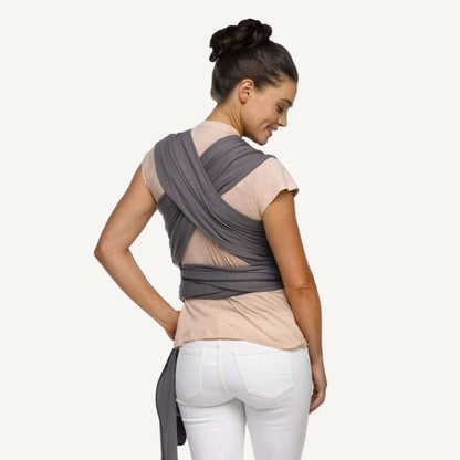 Back view showing the cross-over straps and wrap tie of a Slate grey baby carrier.