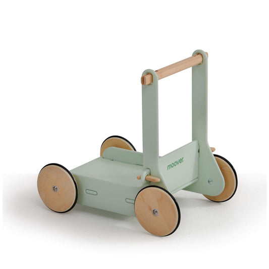 Green Moover Baby Walker wooden push toy with natural wood wheels and handle, featuring a soft green frame and minimalist Danish design.
