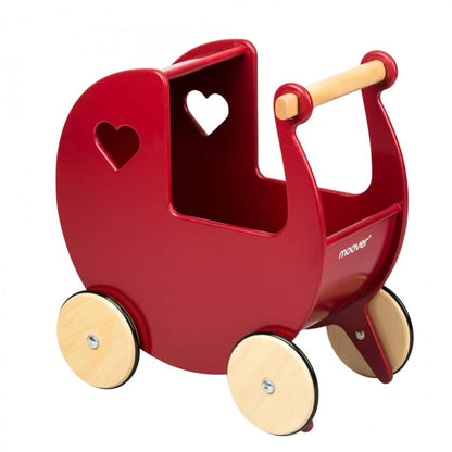 A Moover Doll’s Pram in red, made from smooth wood with heart-shaped cut-outs and natural wooden wheels with rubber rims.
