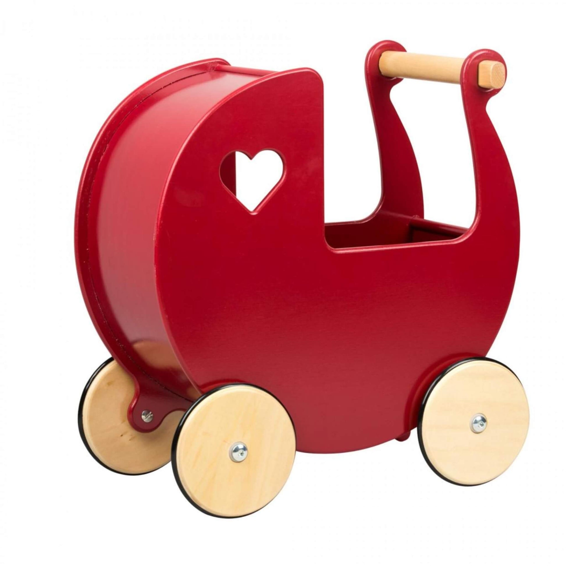 Side view of a red wooden doll’s pram with rounded edges, heart cut-outs, and pale wood wheels on black rubber treads.