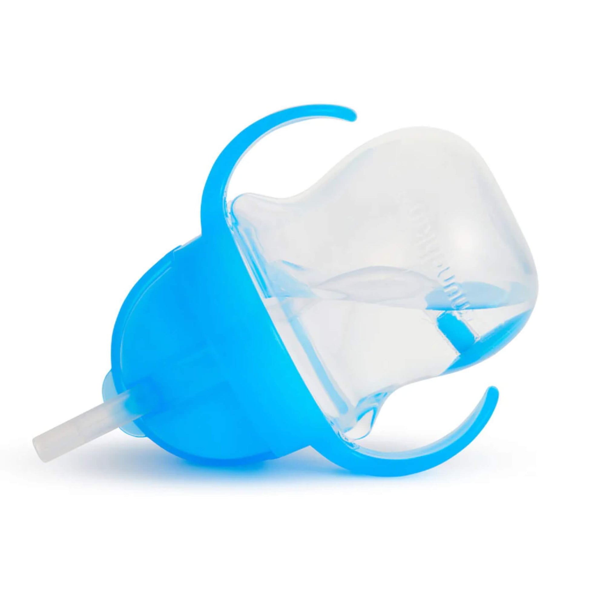 A blue handled toddler cup lying on its side with liquid pooled inside and the weighted straw positioned toward the lowest point.