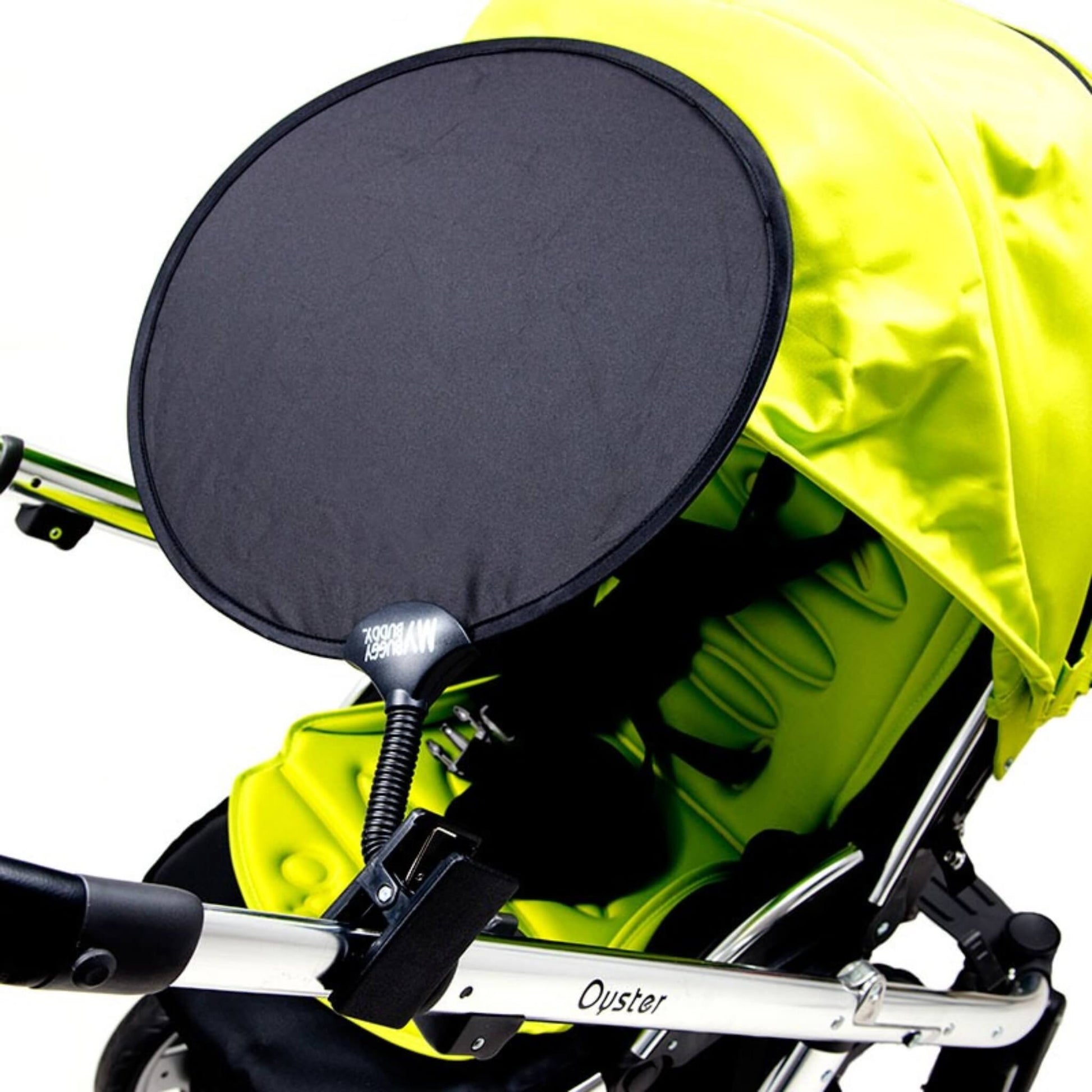 Adjustable black stroller sunshade clipped to a green canopy, showing the flexible arm in use.