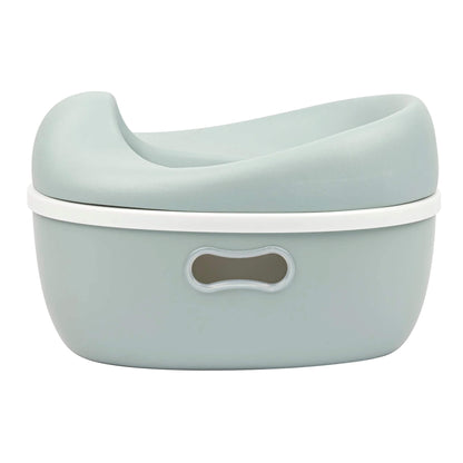 A Nattou 3-in-1 potty in soft green shown fully assembled, with a smooth contoured seat and an oval handle cut-out on the base.