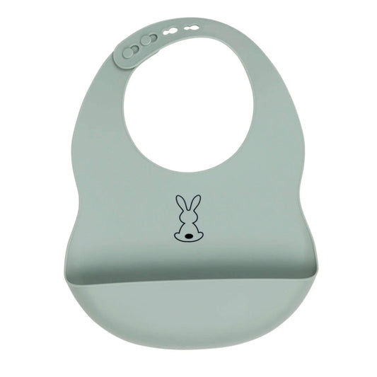 Sage green Nattou Silicone Bib shown laid flat, with its adjustable neck fastenings and deep food-catching pocket visible at the front.