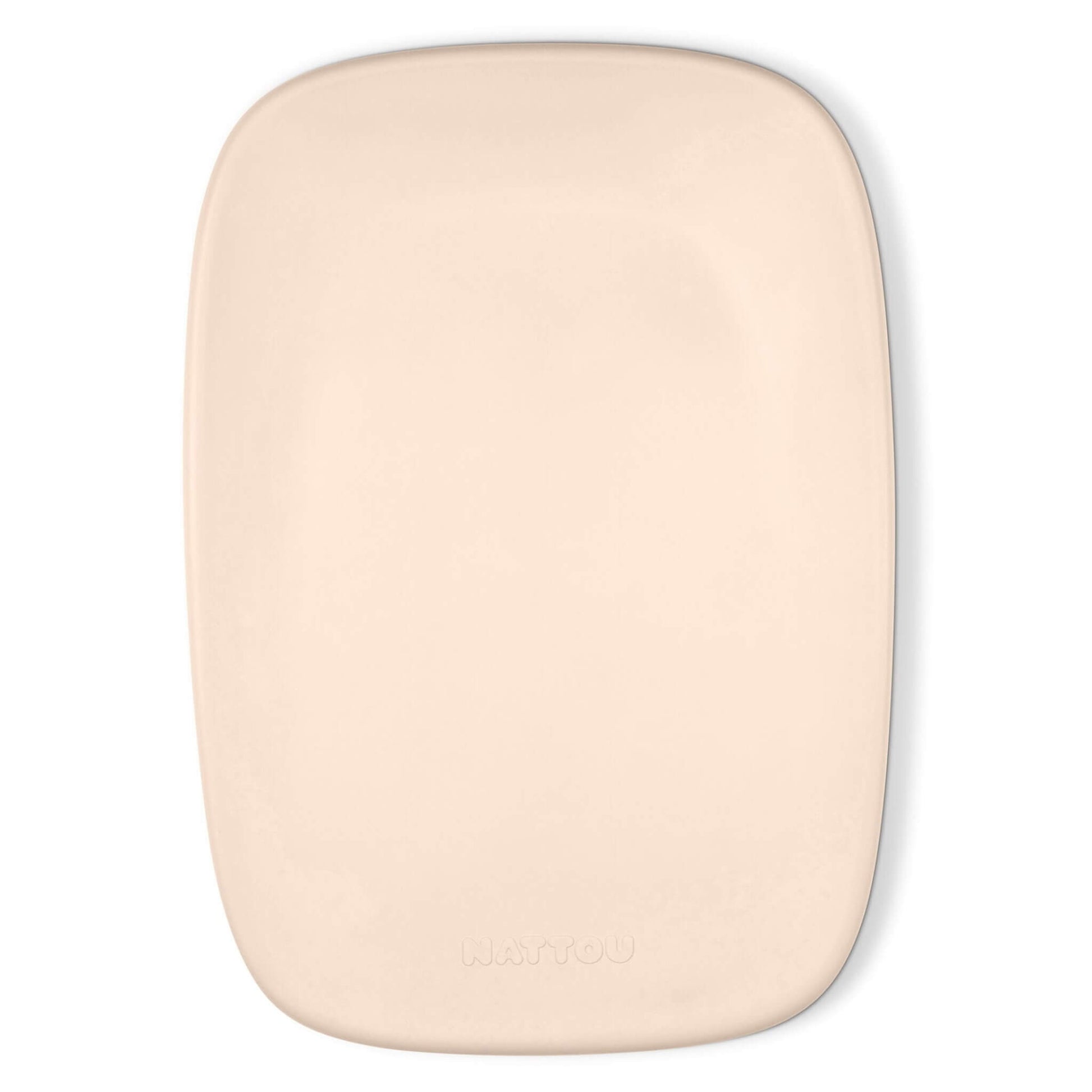 Beige contoured changing pad photographed from above with a smooth surface and rounded corners.