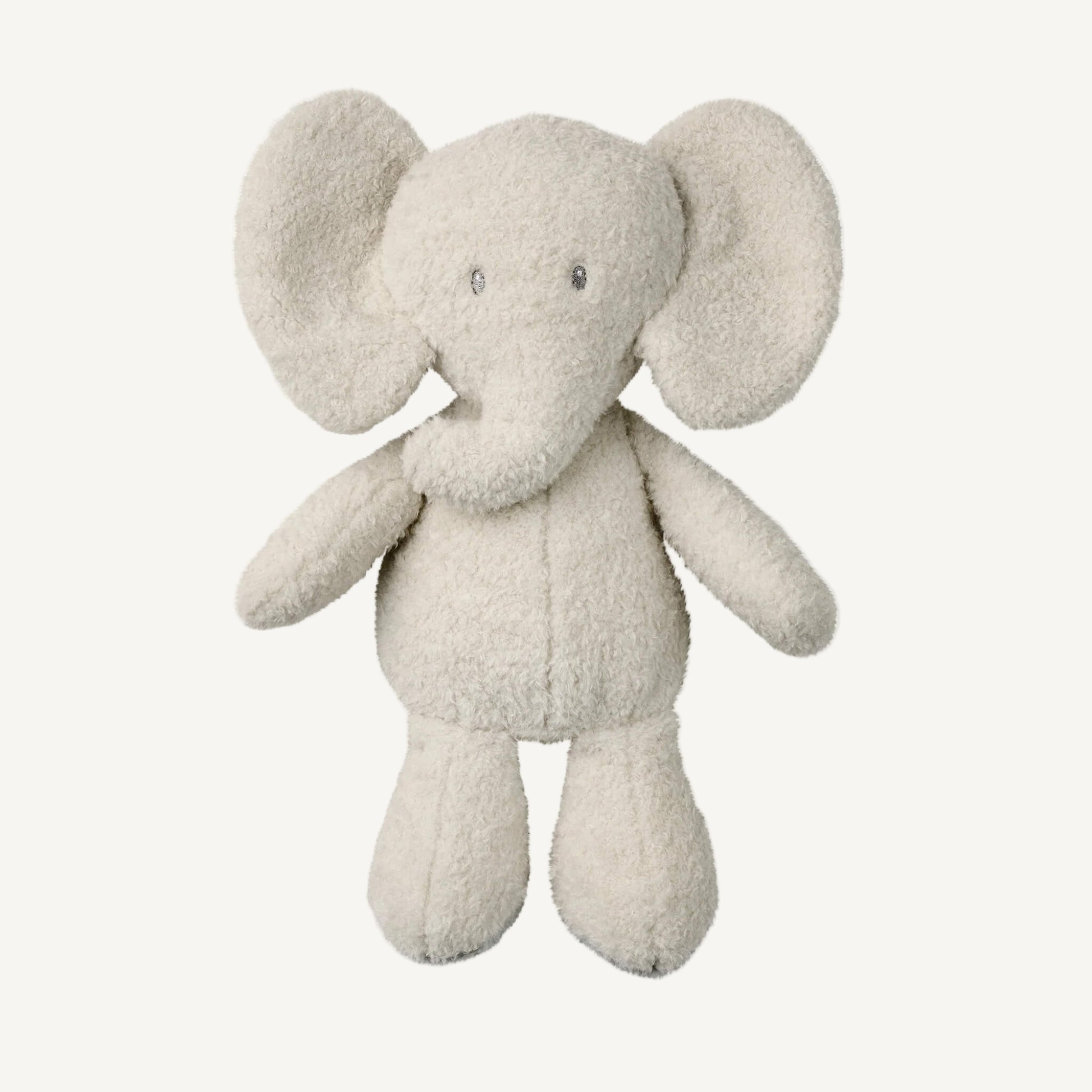 A soft plush grey elephant toy shown lying flat with outstretched arms, large floppy ears, a curved trunk and textured fabric throughout.
