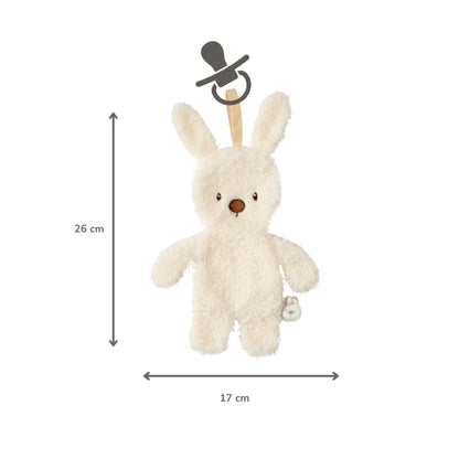 Ecru plush bunny pacifier holder shown with arrows indicating measurements of 26 centimetres in height and 17 centimetres in width, with a dummy icon above the attachment loop.