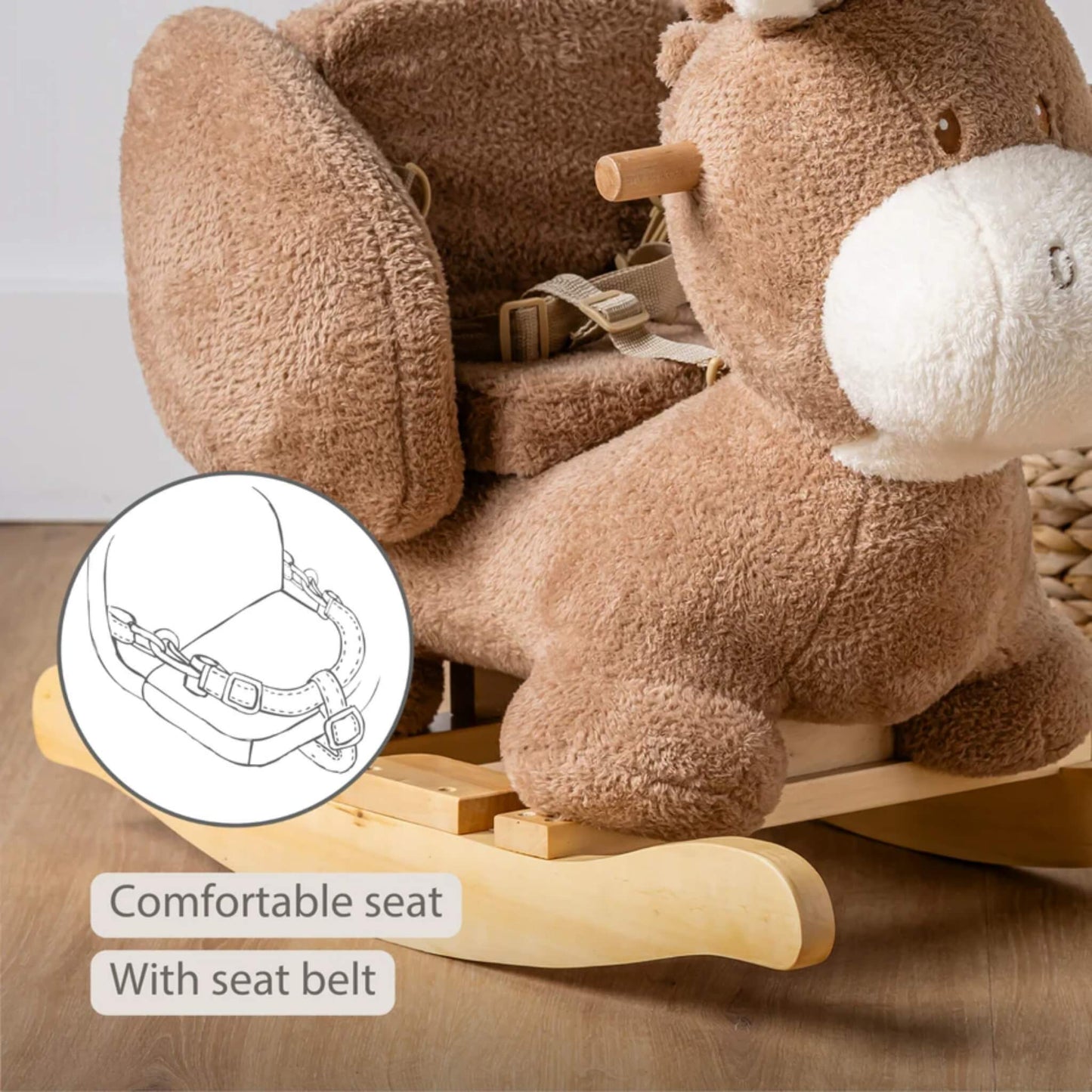 Close-up of a cushioned fabric seat with adjustable safety belt inside a plush rocking donkey toy.