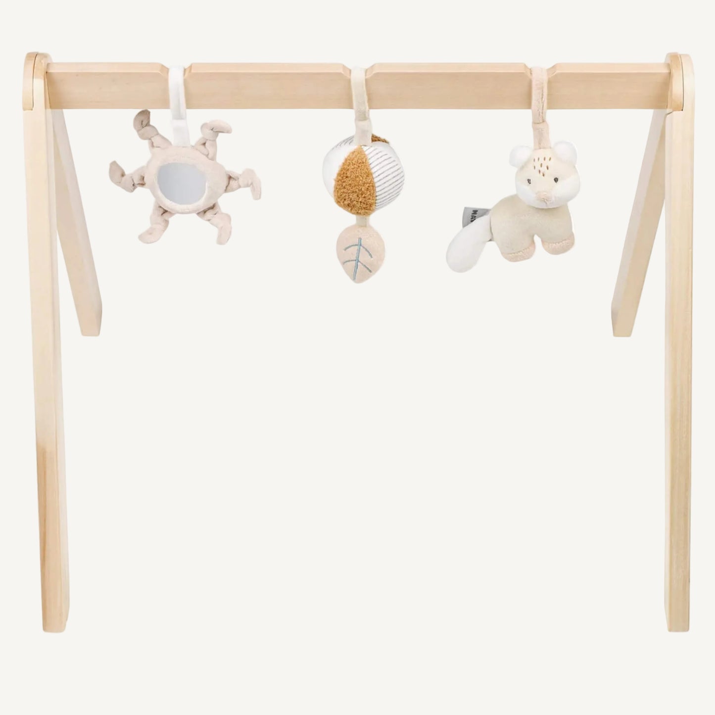 Wooden baby play arch with three soft hanging sensory toys including a mirror sun, textured ball and plush animal, shown against a plain background.