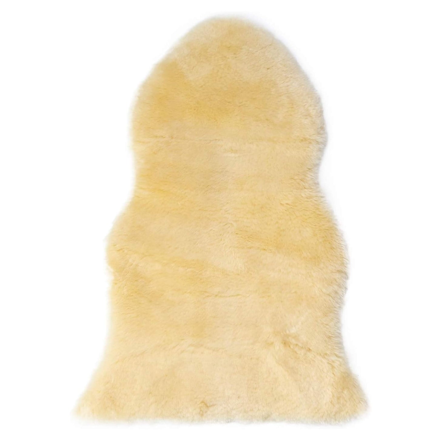 Naturally Sheepskins Natural Baby Rug shown in soft golden Merino wool, cut to a single flowing shape with dense, plush texture.