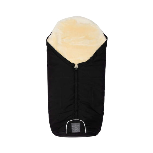 Black footmuff with cream sheepskin lining, shown zipped up with the lining visible at the hood.