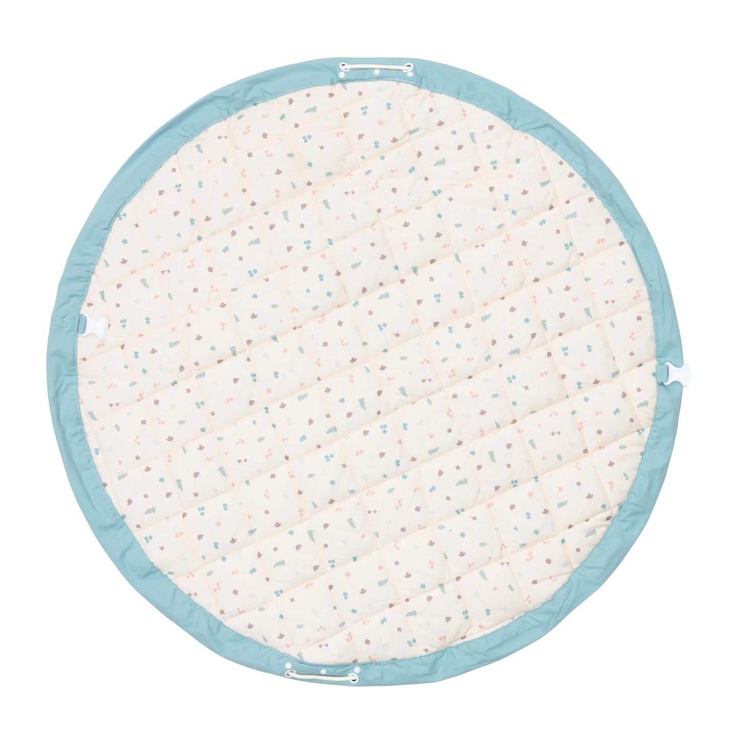 A padded circular play mat shown from the reverse side with a subtle all-over pastel pattern and stitched sections for comfort.