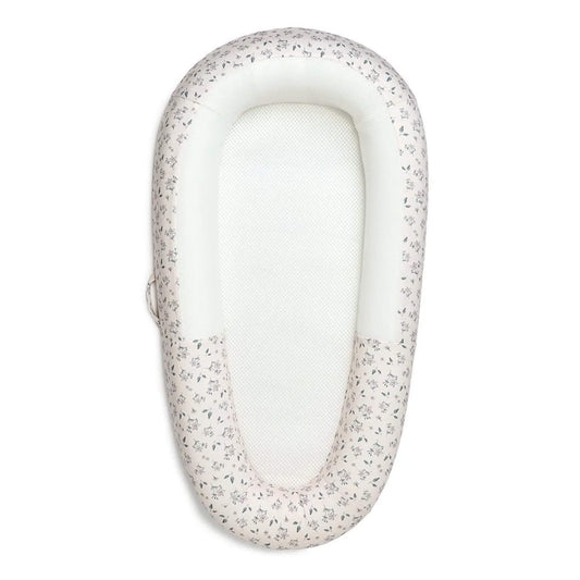 Purflo Sleep Tight Baby Bed in Daisy Dreams design with breathable mesh base and structured sides.