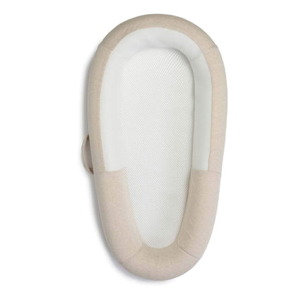 Sleep Tight Baby Bed in Summer Sand by Purflo with breathable mesh sides and a soft padded surround.