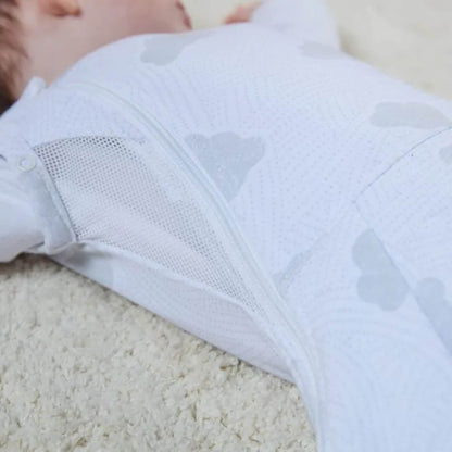 Close-up of side mesh ventilation panel stitched into swaddle sleep bag to support airflow.