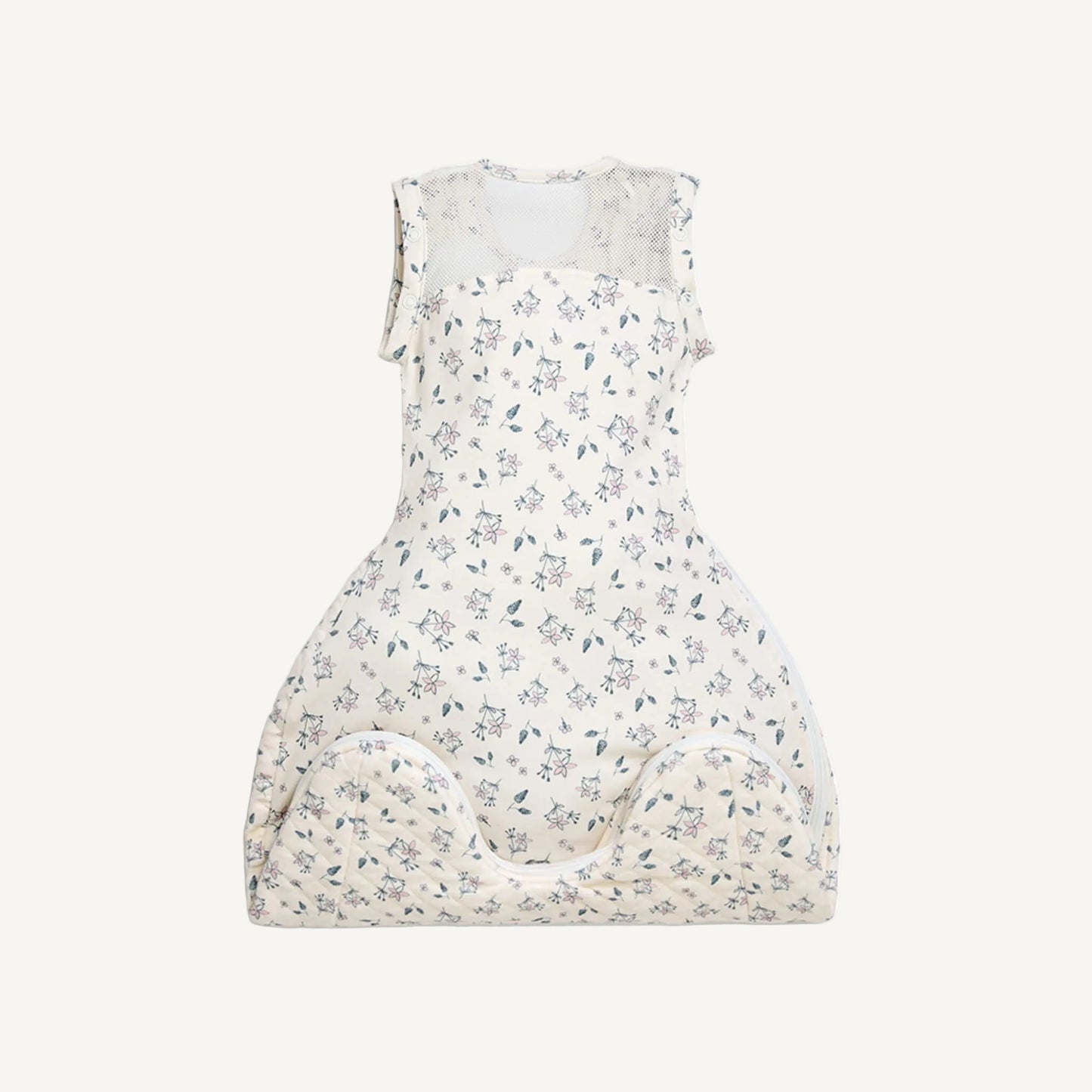 A rear view of a swaddle to sleep bag laid flat, showing the full-width breathable mesh panel across the upper back and shoulders.