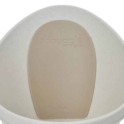 Close-up of the textured backrest inside a baby bath with ‘eco’ embossed into the surface.