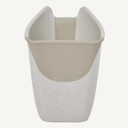 Front view of a cream jug with wide opening and rounded design, featuring a smooth inner lining.