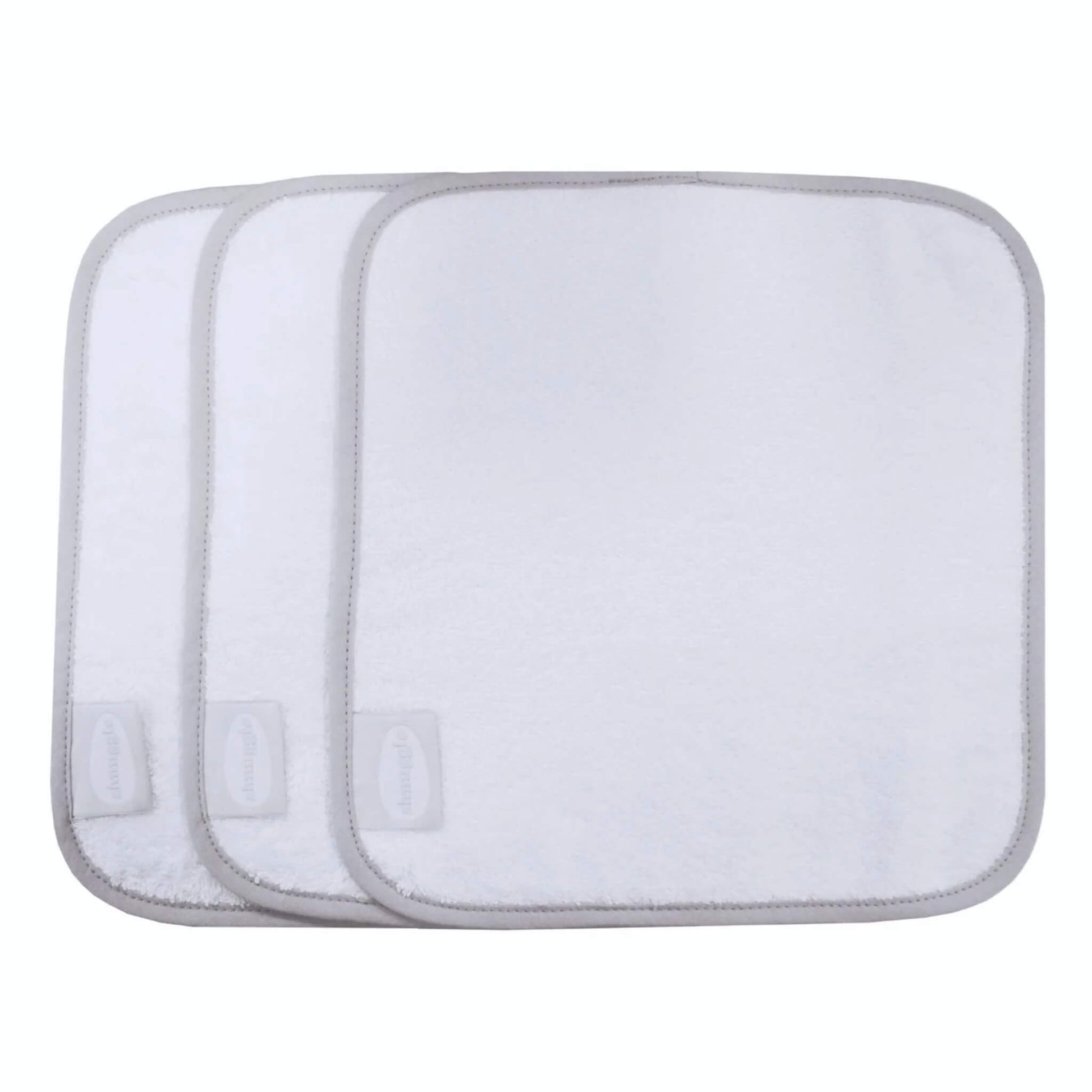 Shnuggle Wash Cloths 3 Pack showing three white bamboo and cotton baby wash cloths with grey stitched edging, stacked slightly offset on a plain background.