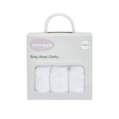 A boxed retail pack containing three folded white baby wash cloths, shown through a clear window in a pale grey cardboard box with a carry handle.
