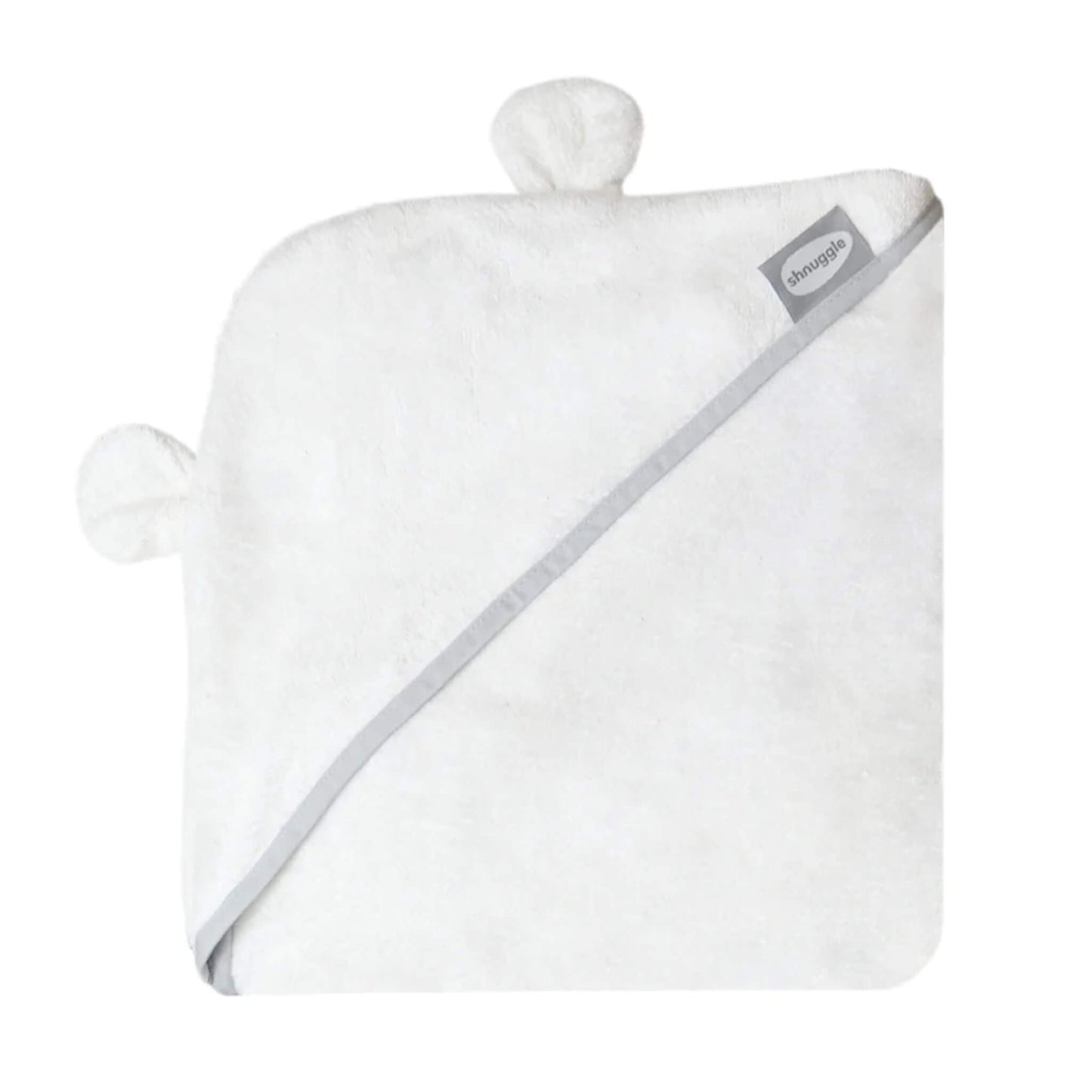 Shnuggle Wearable Baby Towel in white with a hood and soft bear ear details, shown laid flat with grey edge binding and fabric label visible.