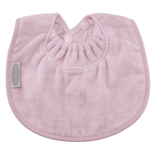 Silly Billyz Towel Biblet in soft pink, made from absorbent towelling with a rounded shape, gentle elasticated neckline, and snap button closure for a comfortable fit on young babies.